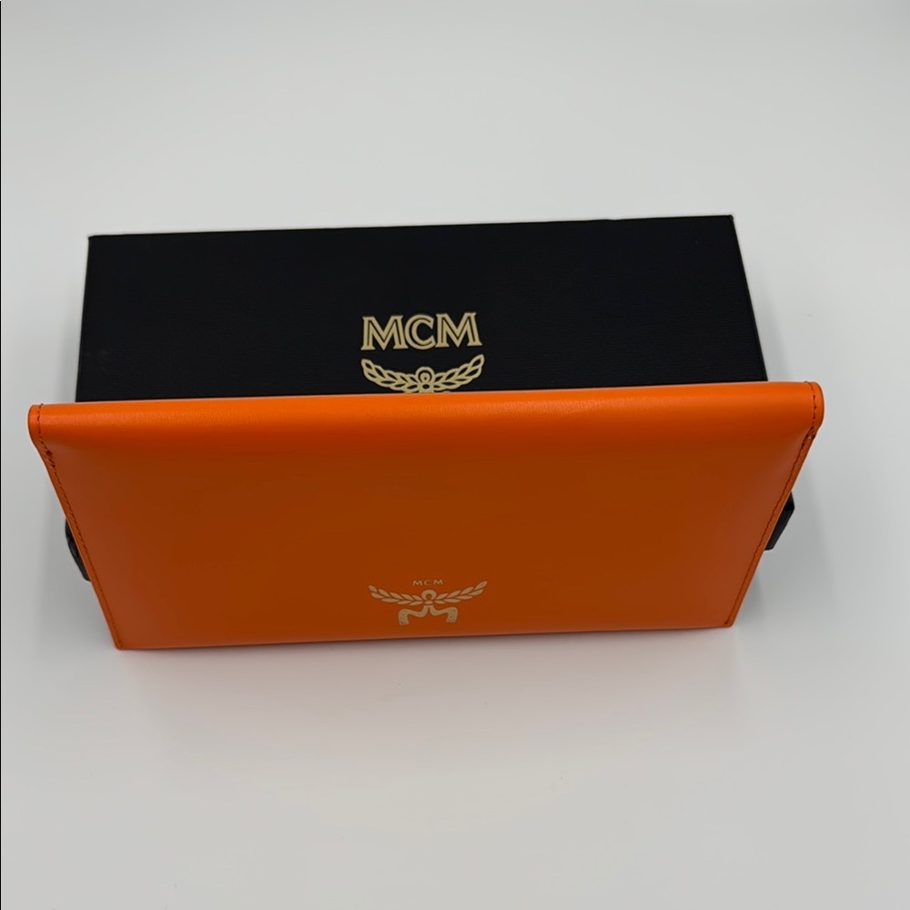 MCM Vibrant Orange Leather Clutch NIB - Picture 2 of 7